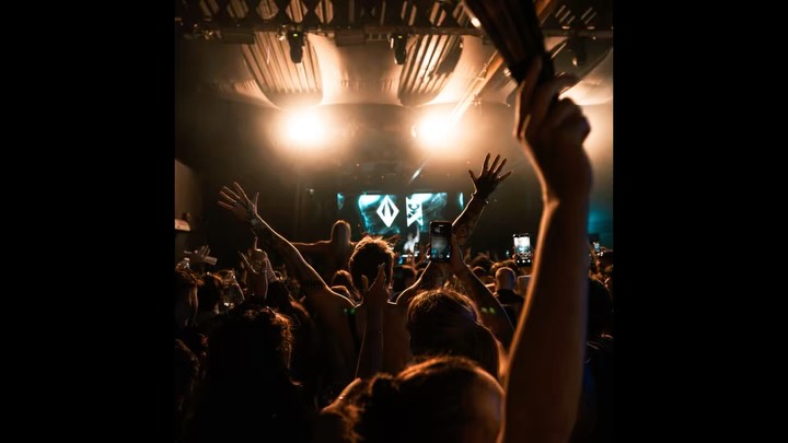 Hands in the air under the rig
